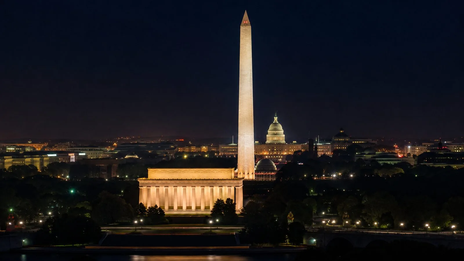 Memorials lit after dark on the National Mall, which stays open 24 hours a day