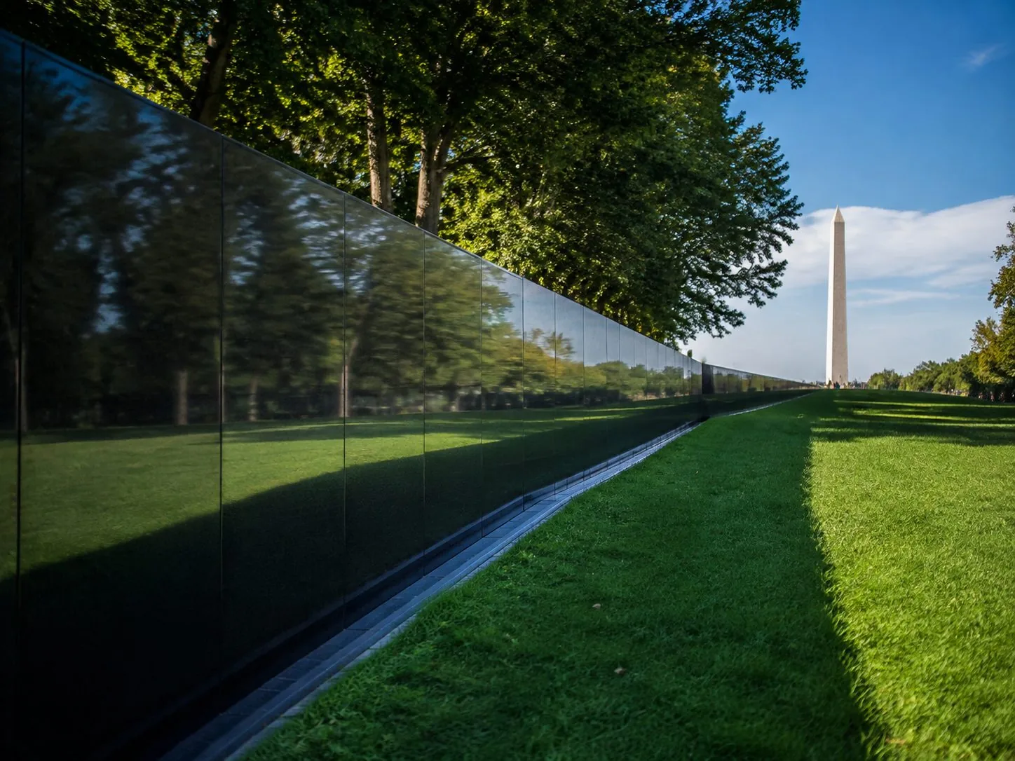 The Vietnam Veterans Memorial Wall cut into the slope